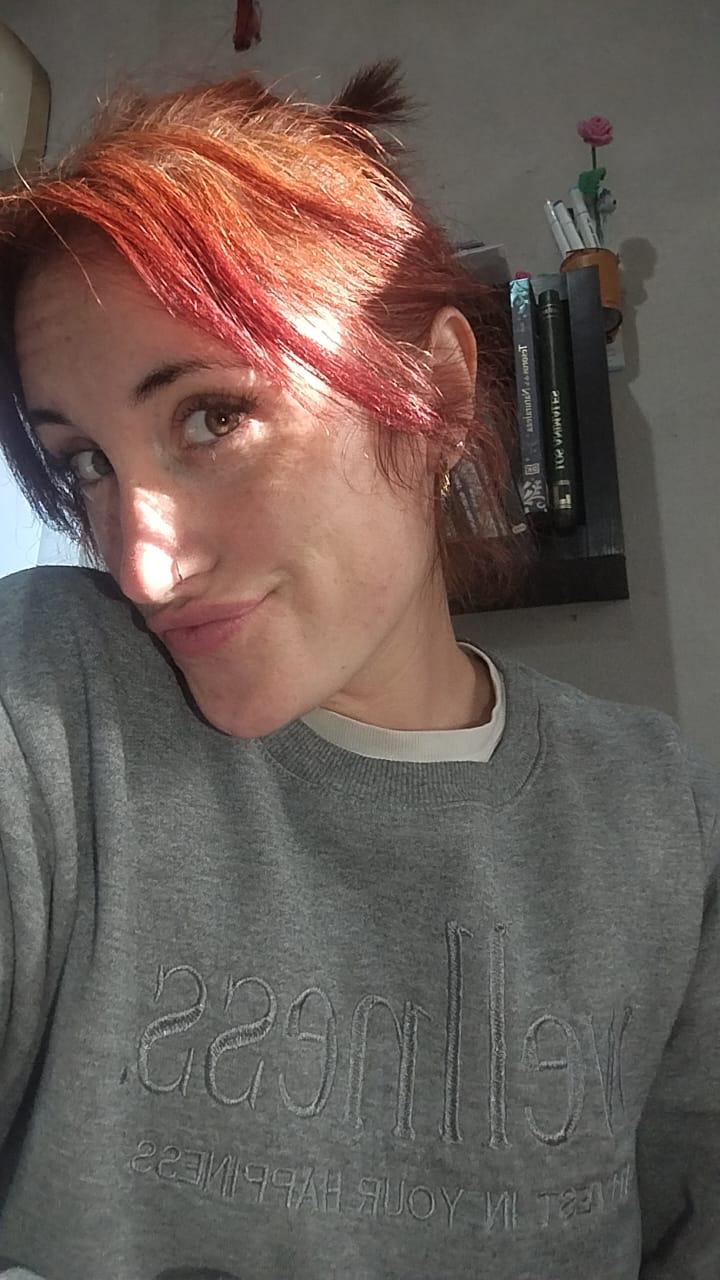 1779155430Meli-redhead11